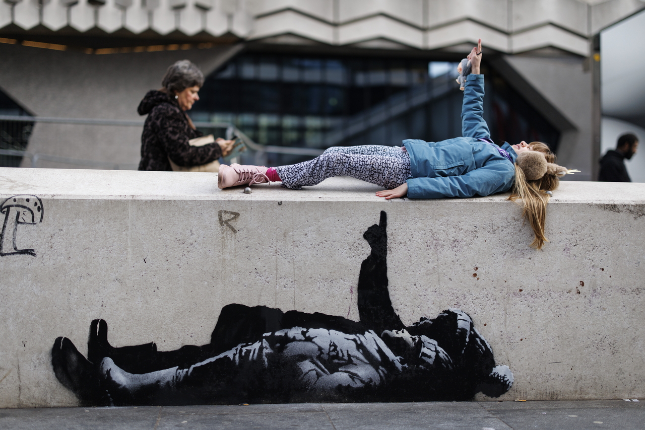 Banksy unveils new art in London following speculation over murals