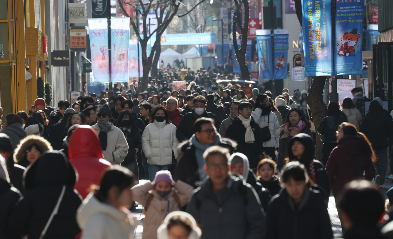 The streets of Myeong-dong are bustling with people. (Yonhap)