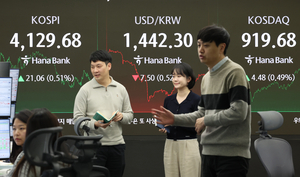 Seoul stocks end higher on chip rally; won sharply up