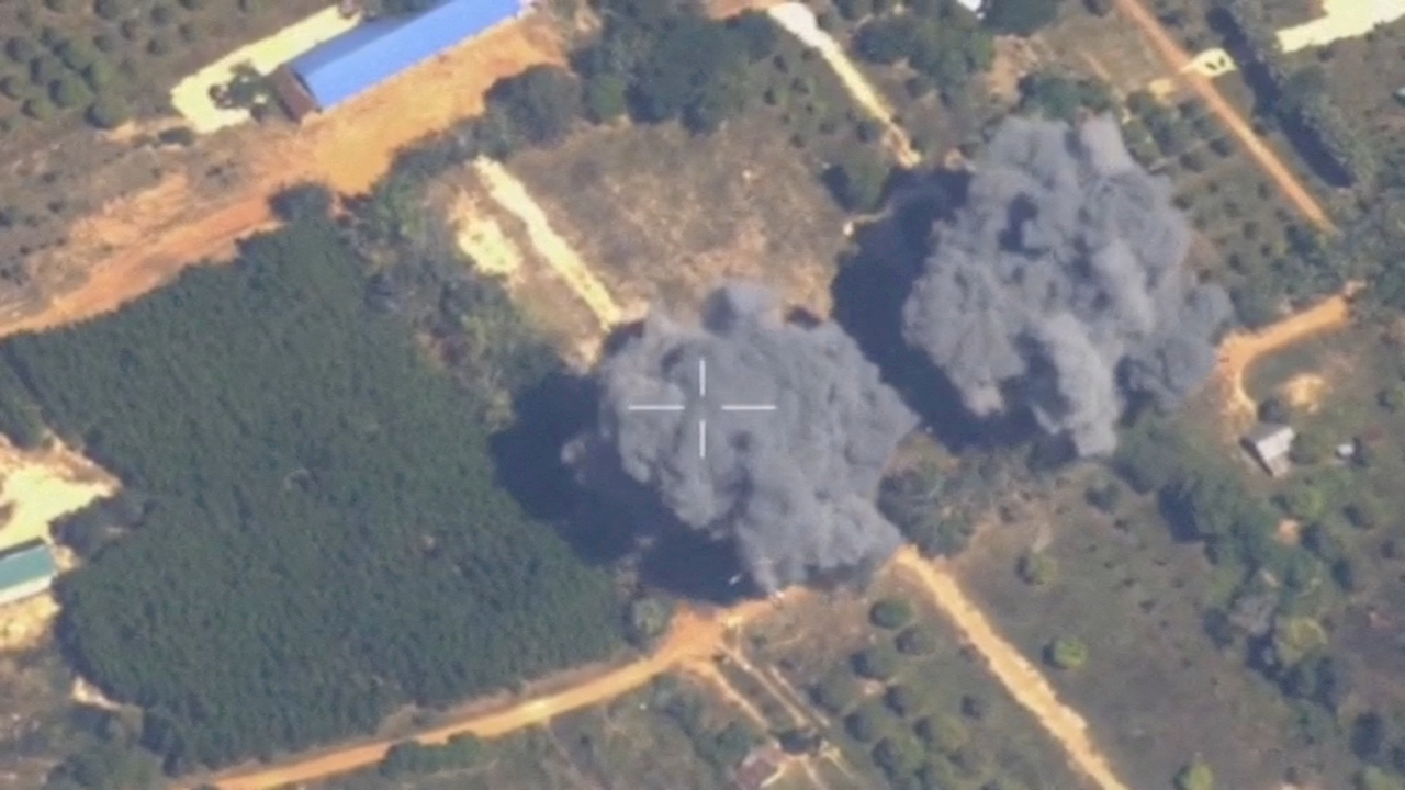 Footage shows smoke rising following what Thailand said was airstrikes carried out in Cambodia along a disputed border area, in Preah Netr Preah, Banteay Meanchey Province, Cambodia, in this screen grab taken from a handout video released on Dec. 15. (Reuters-Yonhap)