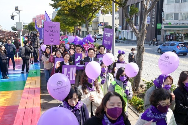 Residents and Jeju Island government officials march in celebration of International Women’s Day on March 8 in Jeju City, Jeju Island. (Jeju Island)