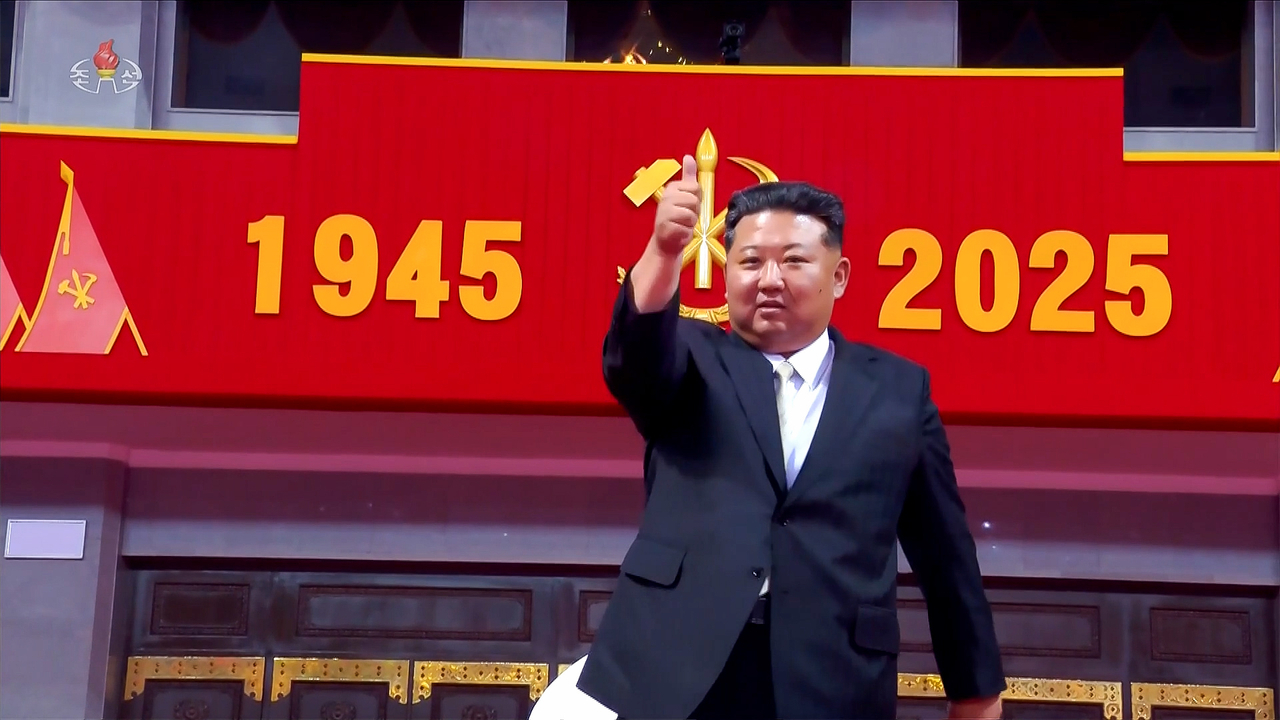This image, captured from footage of North Korea's state-run TV network on Friday shows the North's leader Kim Jong-un delivering a speech at an event celebrating the 80th anniversary of the founding of the ruling Workers' Party of Korea the previous day. (Yonhap)
