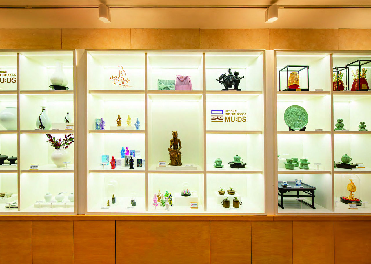 Items from MU:DS, the National Museum of Korea’s design brand, are displayed on shelves. (National Museum Foundation of Korea)