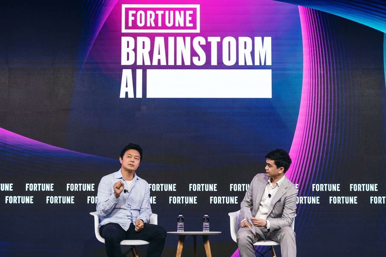 Kyogu Lee (left), founder and CEO of Supertone, speaks at