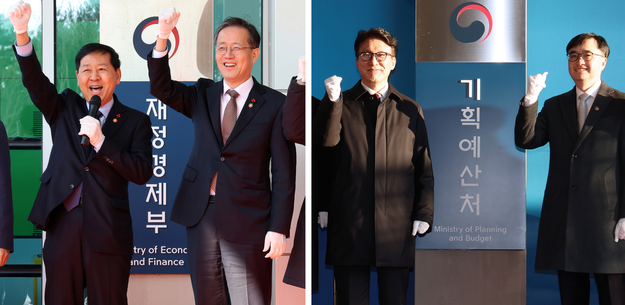Picture on the left shows Finance Minister Koo Yun-cheol  (left) and Vice Finance Minister Lee Hyoung-il cheering during the launch ceremony of the new Finance Ministry at the government complex in Sejong on Friday. On the right, Prime Minister Kim Min-seok (left) and acting Budget Minister Lim Ki-keun pose for a photo at a separate launch ceremony for the Budget Ministry, also held Friday in Sejong. (Yonhap)