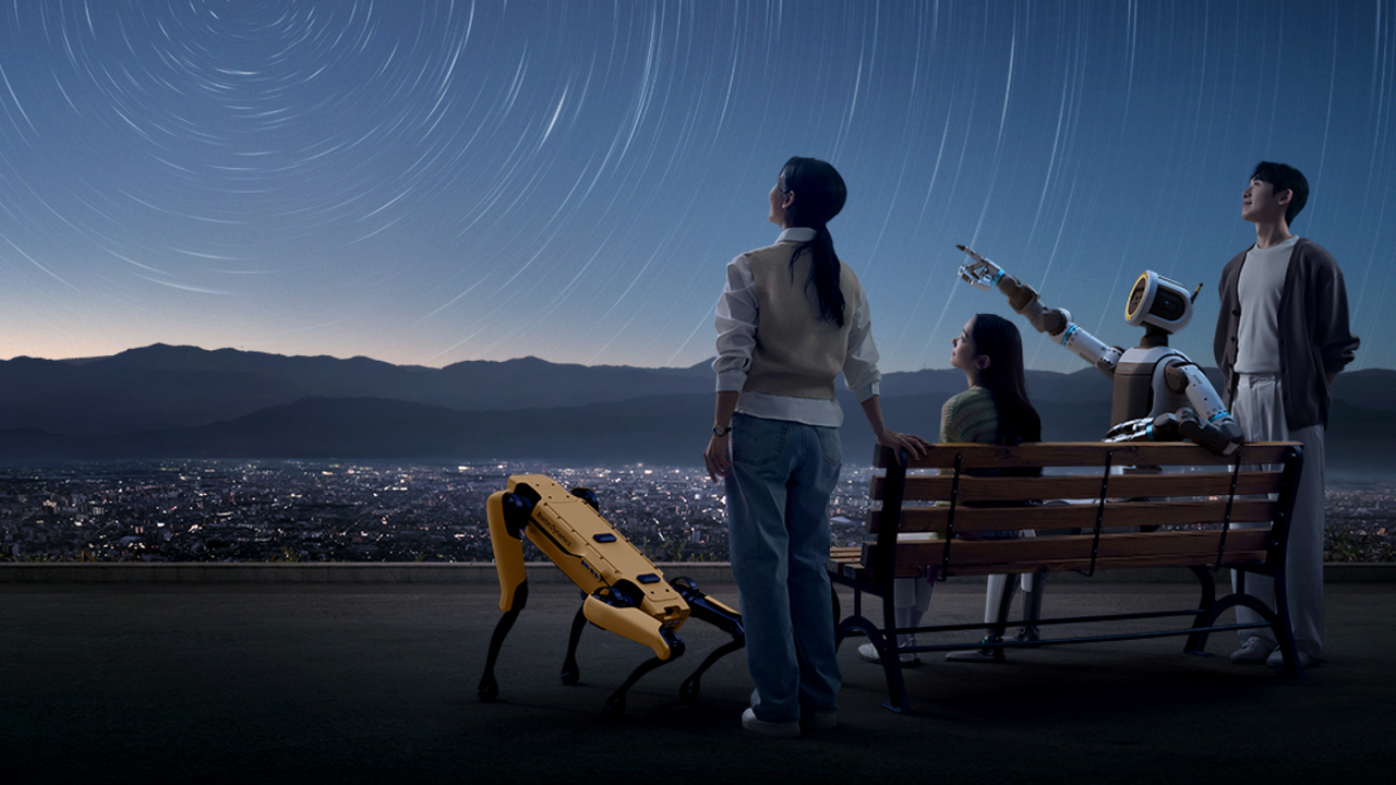 Hyundai Motor Group’s humanoid robot Atlas and four-legged robot Spot are seen in this promotional photo. (Hyundai Motor Group)