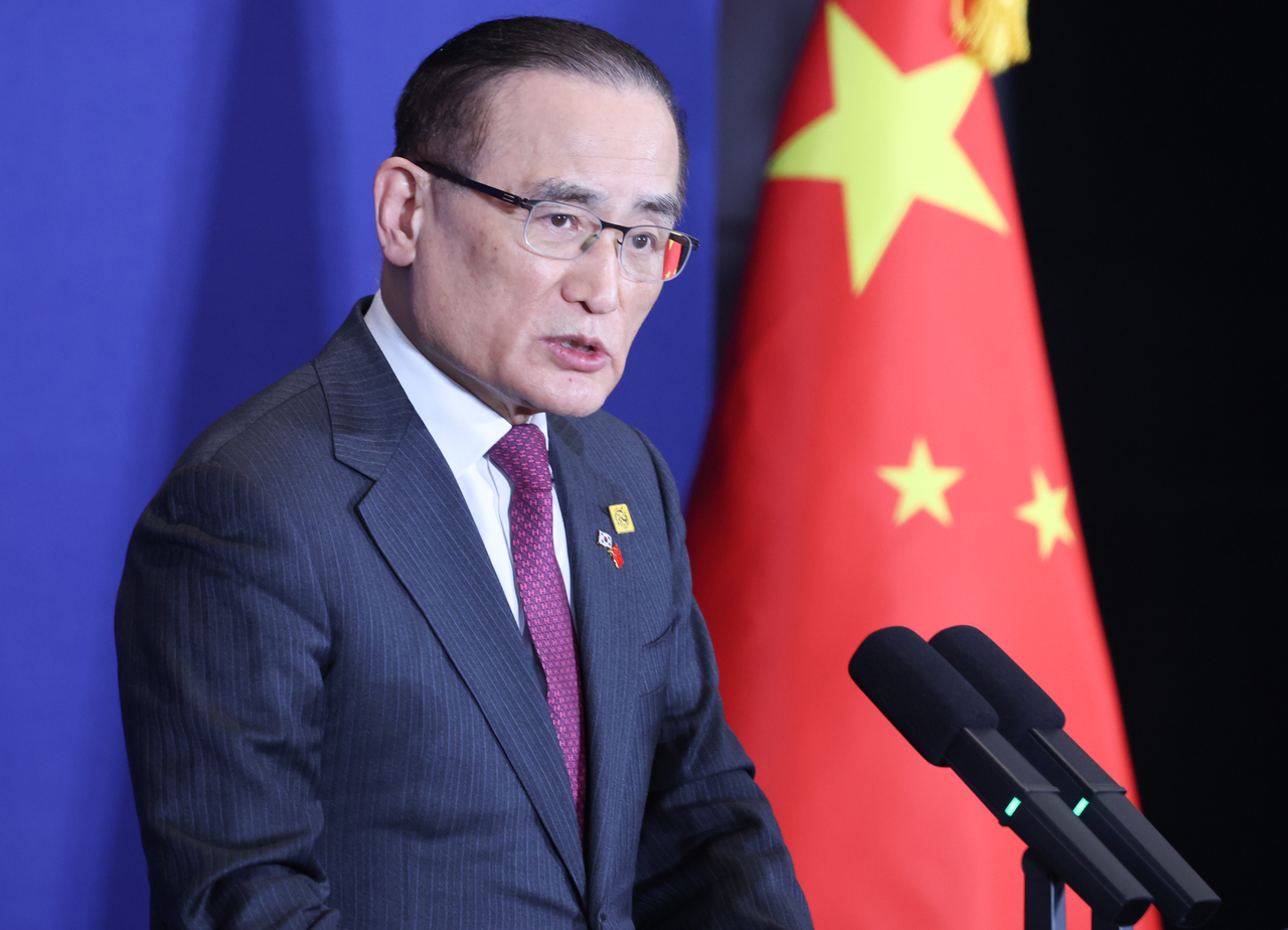 National Security Adviser Wi Sung-lac briefs reporters on the South Korea–China summit at the Korea Press Center in . (Yonhap)