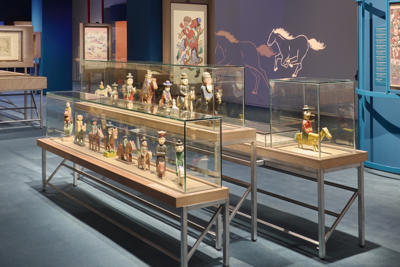 Kokdu figures, traditional funeral figurines, on view in “The Famous Feast of the Horse” (National Folk Museum of Korea)