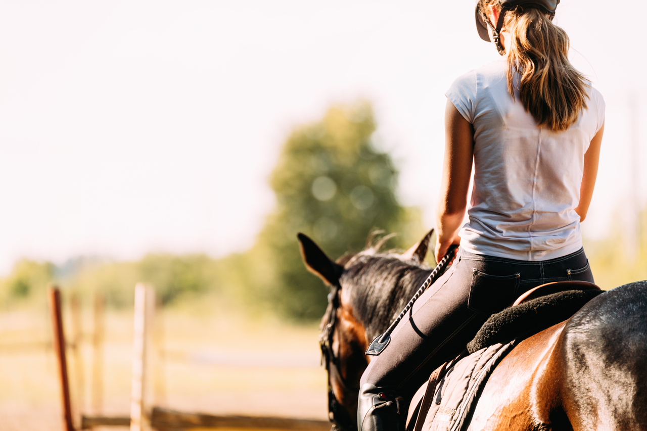 A women riding a horse (Getty Images Bank)