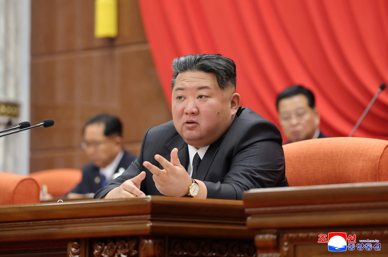 North Korea's leader Kim Jong-un presides over a plenary meeting of the ruling Workers' Party of Korea on Friday. (KCNA via Yonhap)