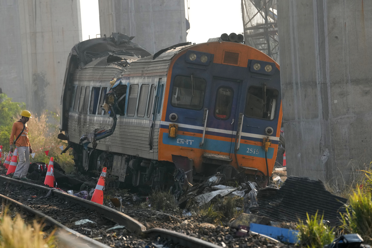 The wreckage of train is seen, a day after a construction crane fell into a passenger train in Nakhon Ratchasima province, Thailand, Thursday. (AP-Yonhap)