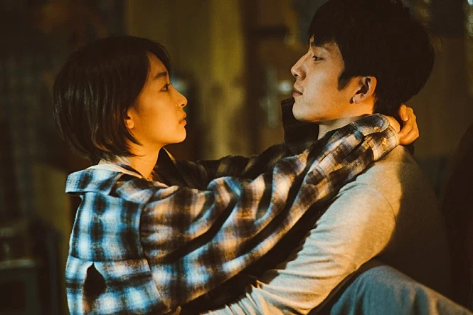 Zhou Dongyu (left) and Jing Boran star in "Us and Them." (Huaxia Film Distribution)