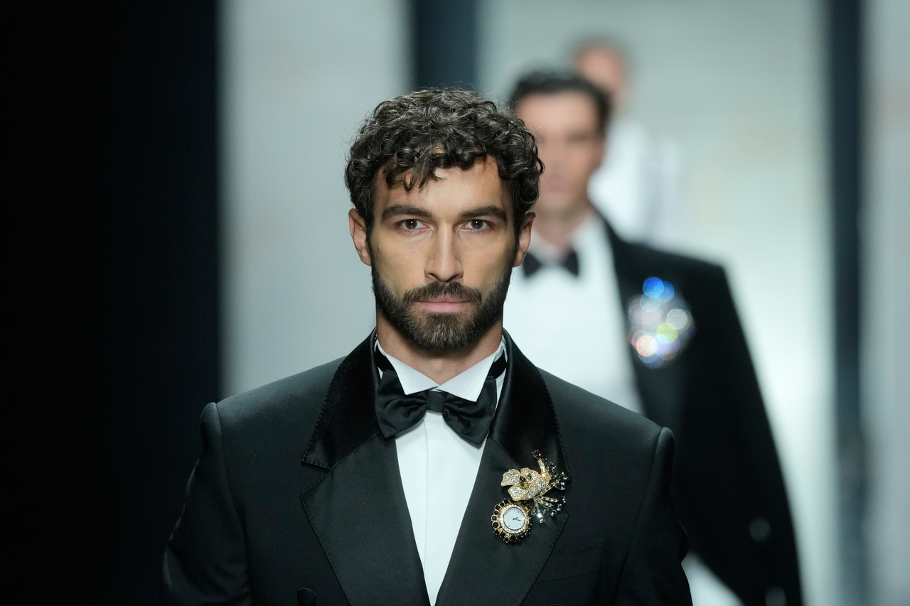 A model wears a creation as part of the Dolce & Gabbana fall-winter 2026-2027 men's collection presented in Milan on Jan. 17. (AP Photo/Luca Bruno)