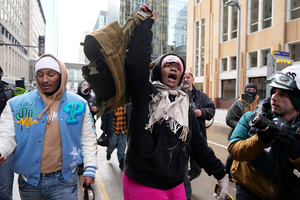 Pro- and anti-ICE demonstrators face off