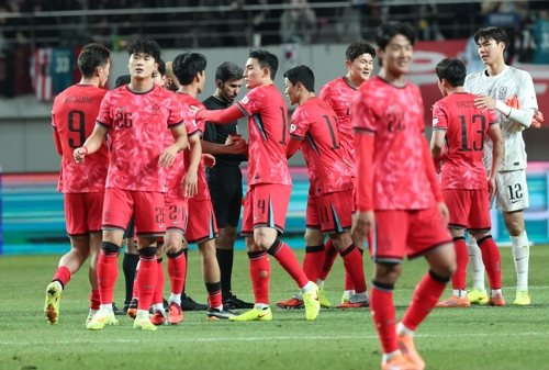 South Korean players celebrate their 1-0 win over Ghana in the teams' friendly football match at Seoul World Cup Stadium in Seoul, in this Nov. 18, 2025, file photo.