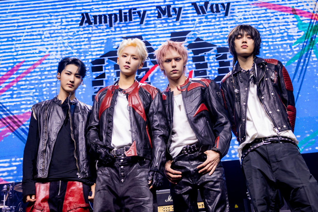 AxMxP poses for a group photo during a media showcase held ahead of the release of "Amplify My Way," at Yes24 Wanderloch Hall in Seodaemun-gu, western Seoul, Wednesday. (FNC Entertainment)