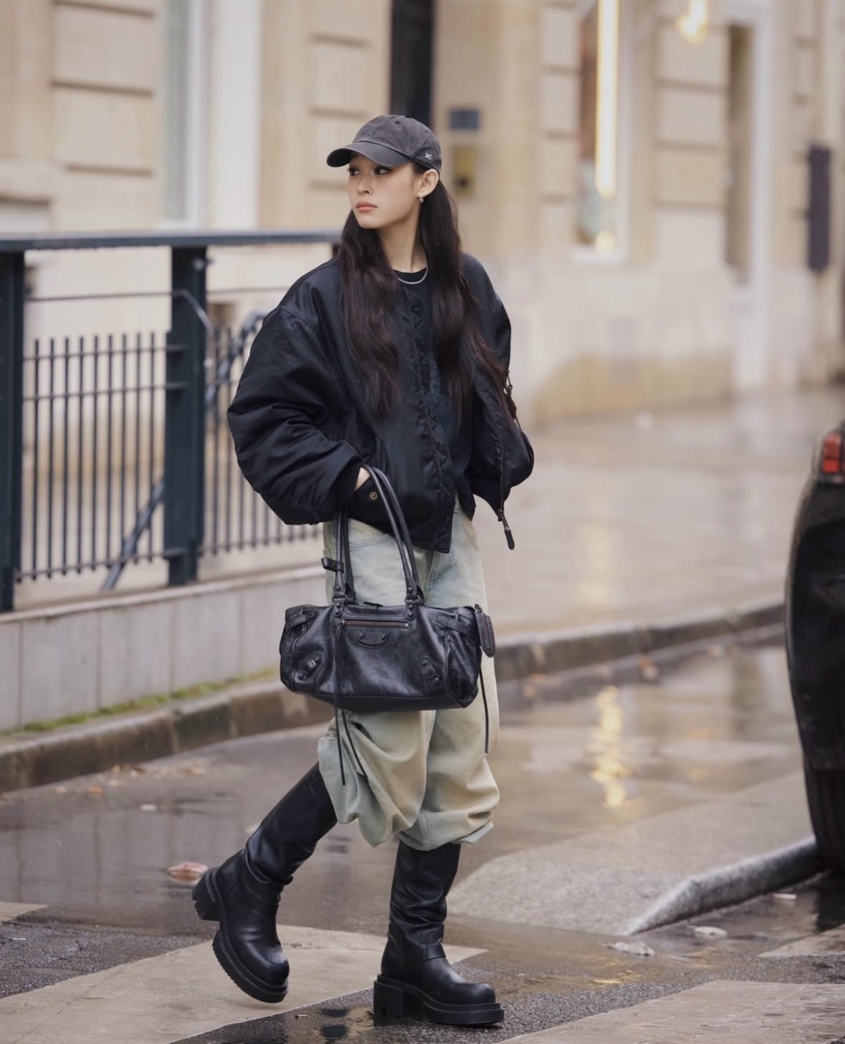 Annie of K-pop group Allday Project is spotted in Paris wearing a Balenciaga leather jacket and carrying a matching bag. (Instagram)