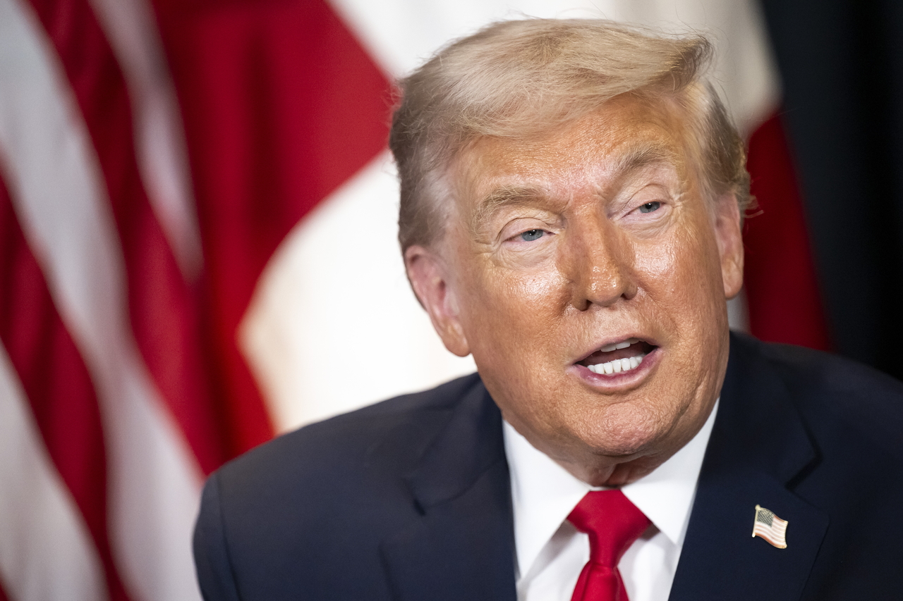 U.S. President Donald Trump speaks during a meeting with NATO Secretary General Mark Rutte on the sidelines of the World Economic Forum in Davos, Switzerland, on Wednesday, in this photo released by the Associated Press. (Yonhap)