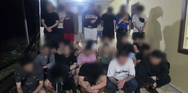 South Koreans detained in Cambodia over alleged involvement in online scam operations are photographed after being apprehended by local authorities. (Yonhap)