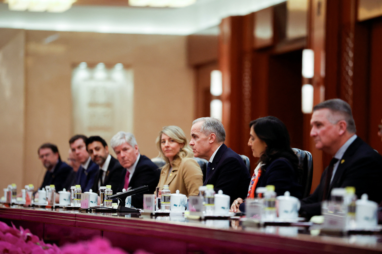 Canada's Prime Minister Mark Carney (third from right) speaks during a meeting with the Chairman of the Standing Committee of the National People's Congress of China Zhao Leji (not pictured) at the Great Hall of the People in Beijing on Jan. 15.   Reuters-Yonhap
