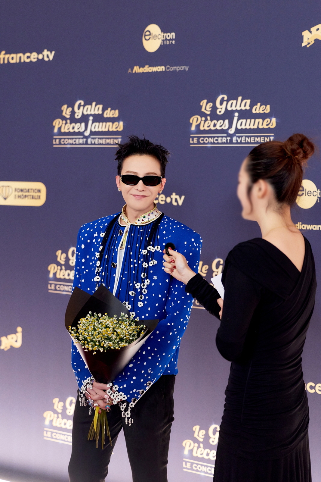 G-DRAGON at a charity event in France (Galaxy Corporation)