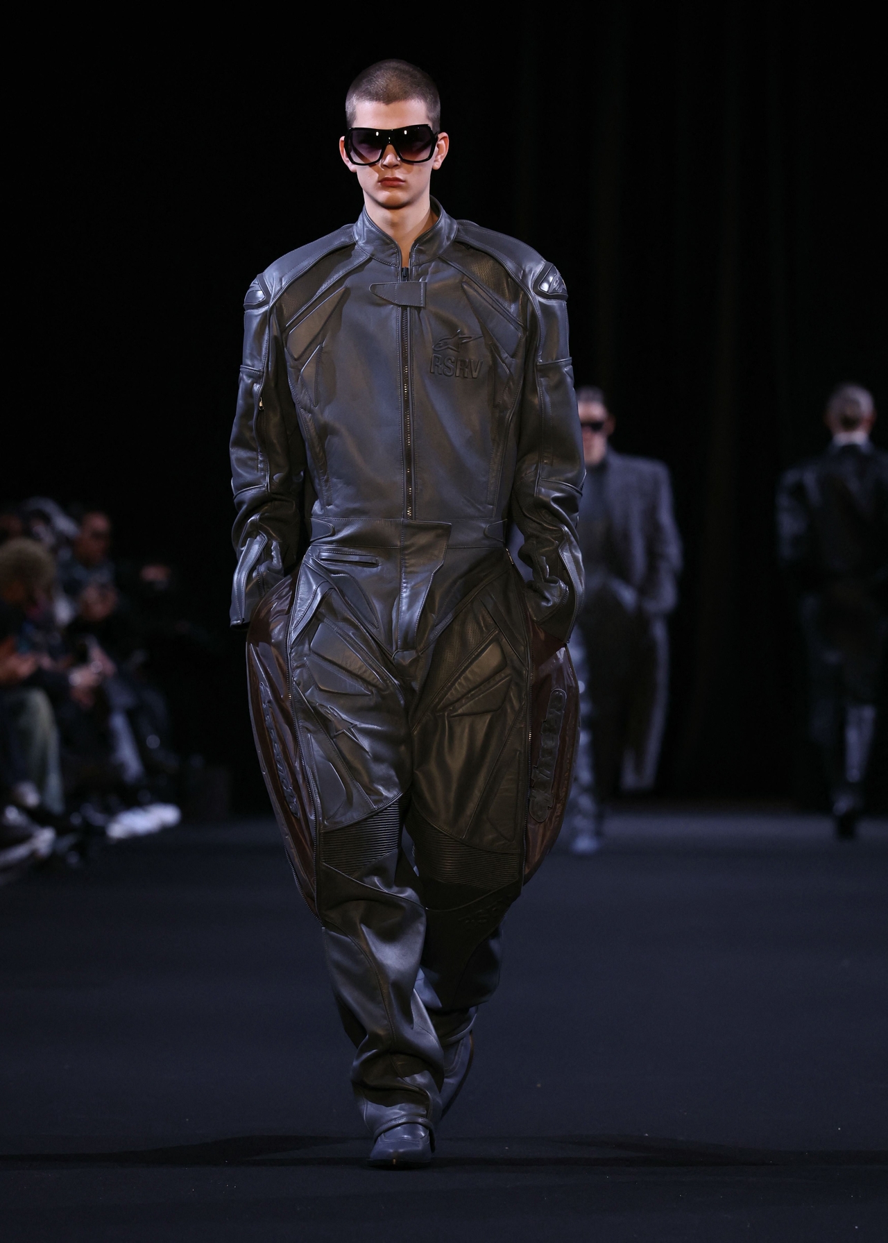 A model presents a creation by Juun.J for Paris Men’s Fashion Week for fall-winter 2026. (Alain Jocard/AFP)