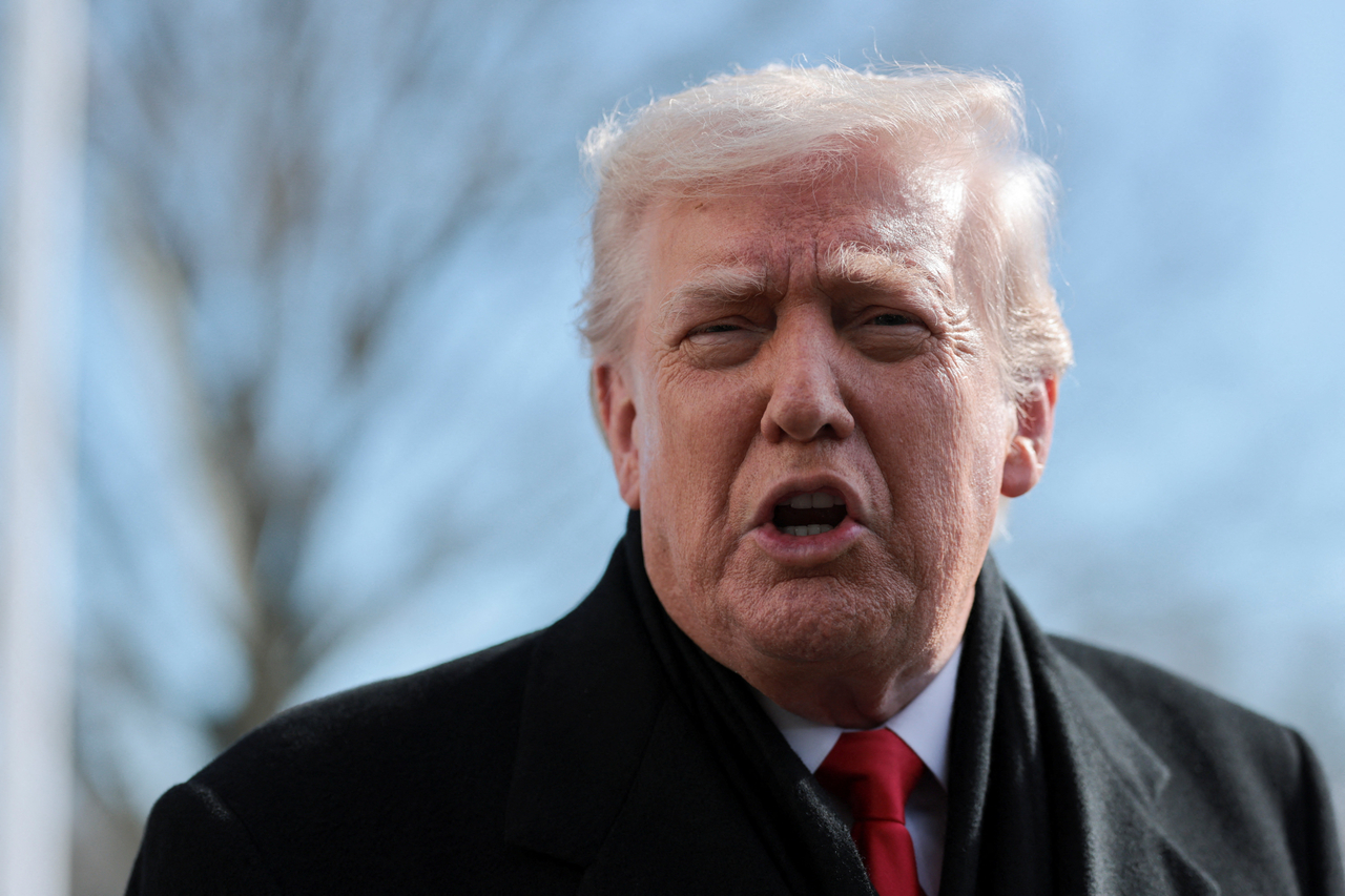 US President Donald Trump speaks with the media at the White House in Washington on Tuesday, in this photo released by Reuters. (Yonhap)