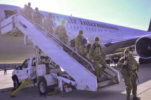 Soldiers of the 2nd Stryker Brigade Combat Team of the 2nd Infantry Division get off an aircraft at Osan Air Base in Pyeongtaek, about 60 kilometers south of Seoul, Tuesday. (US Forces Korea)