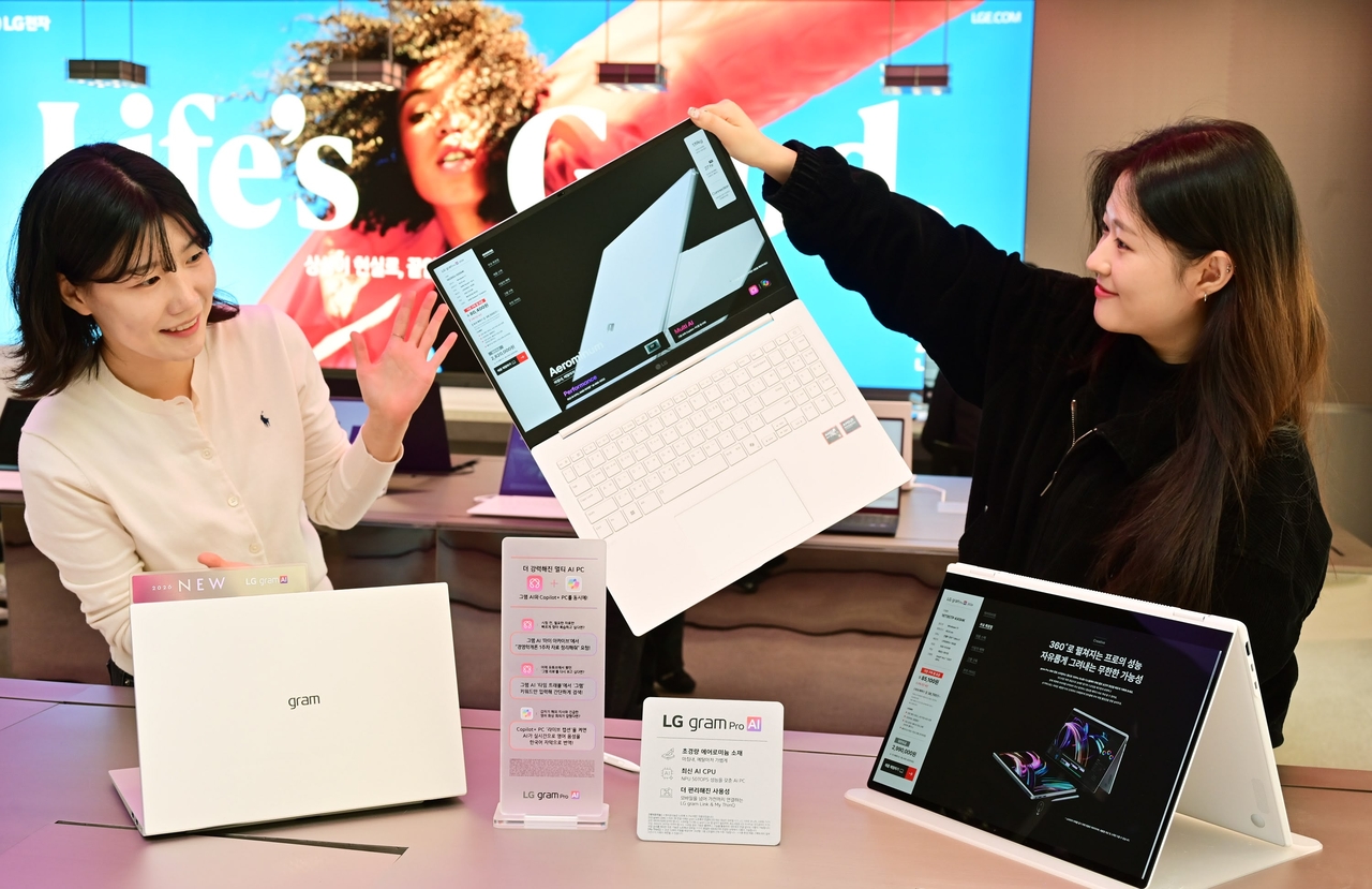 Visitors explore LG Electronics&rsquo; newly released 2026 Gram Pro AI laptops at the company&rsquo;s D5 flagship store in Seoul on Jan. 26. (LG Electronics)