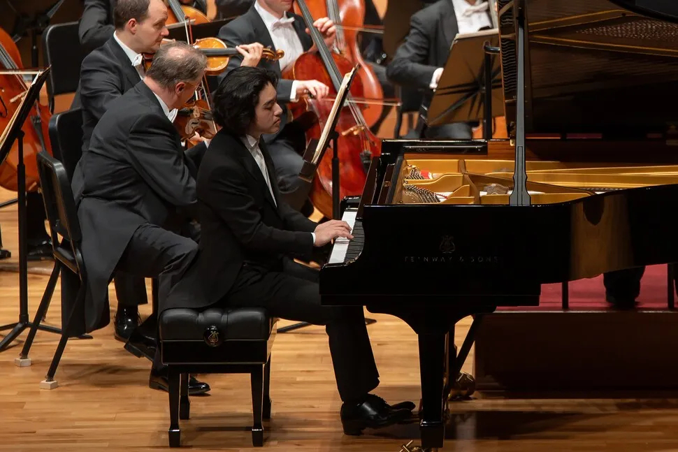 Lim Yunchan performs Schumann’s Piano Concerto in A minor during a concert with Dresden Staatskapelle under the baton of Chung Myung-whun, on Sunday at the Seoul Arts Center. (Vincero)