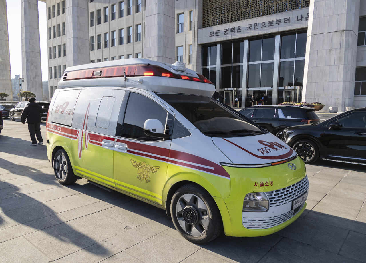 An ambulance is parked in front of the National Assembly building in central Seoul. (Yonhap)