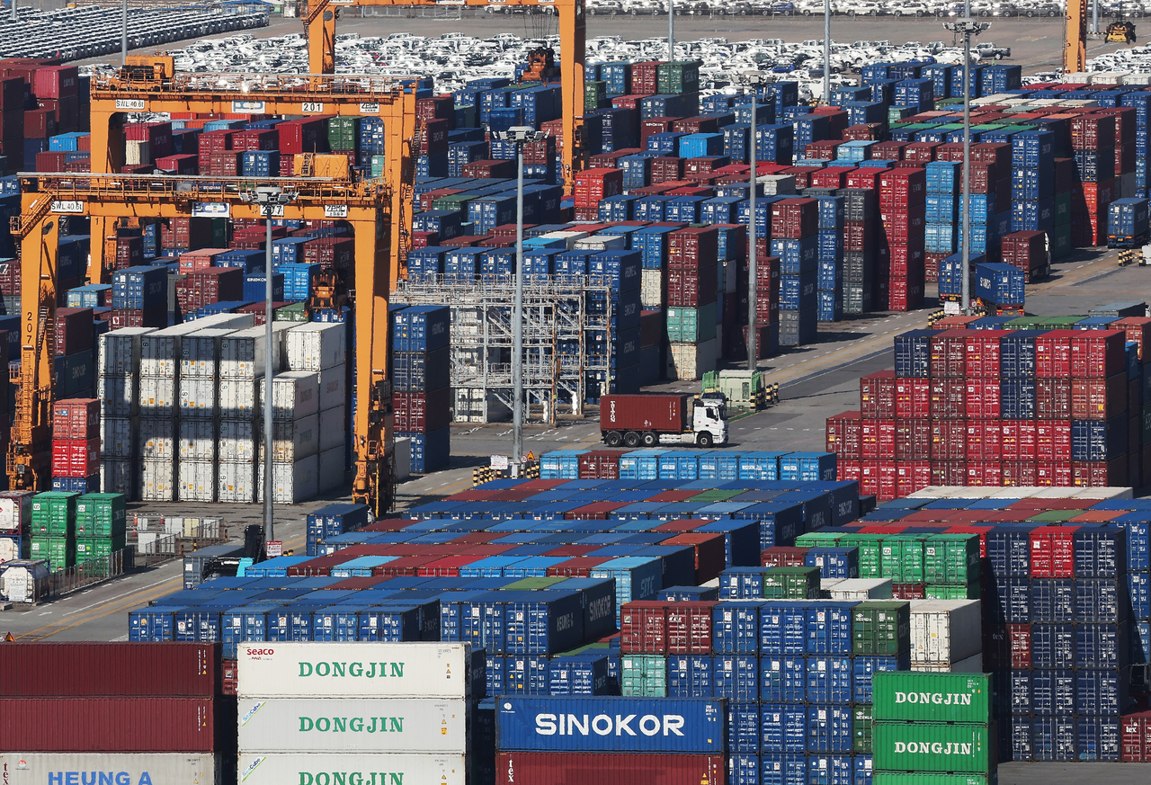 Export containers are stacked at Pyeongtaek Port in Gyeonggi Province. (Yonhap)