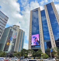 Woori logs W3.14tr net profit, boosts shareholder returns