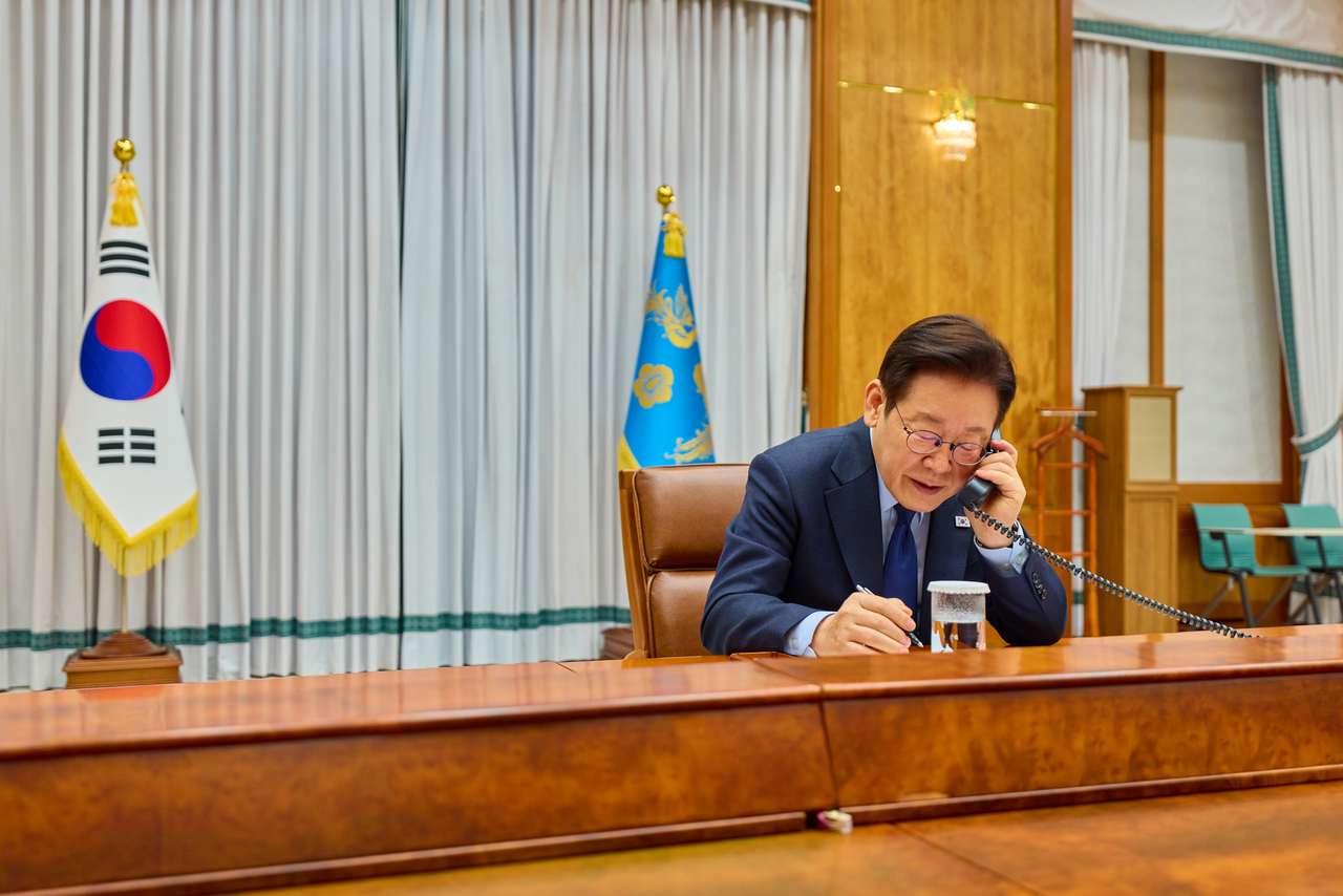 President Lee Jae Myung is speaking with NATO Secretary General Mark Rutt on the phone in this photo provided by Cheong Wa Dae (Cheong Wa Dae via Yonhap)