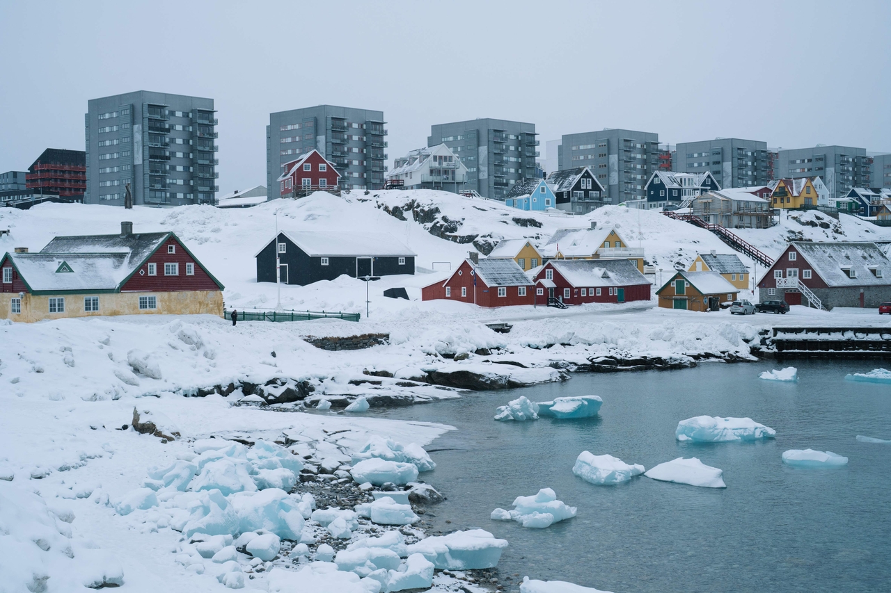 Apartment buildings and houses are pictured in Nuuk, Greenland, in March 2025. (AFP-Yonhap)