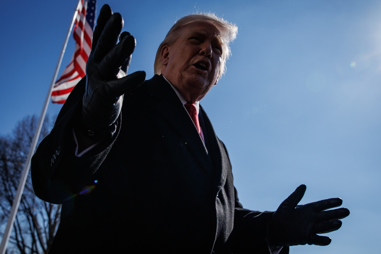 US President Donald Trump speaks to reporters before departing from the South Lawn of the White House aboard Marine One in Washington, DC, Friday. (EPA-Yonhap)