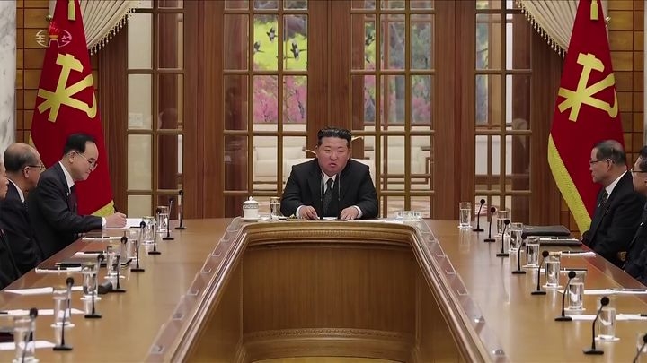 North Korean leader Kim Jong-un presides over the 27th Political Bureau meeting of the 8th Central Committee of the Workers’ Party of Korea at the party headquarters in Pyongyang on Feb. 7, in this screencaptured image of a segment aired by Korean Central Television on Feb. 8. The meeting adopted a decision to convene the 9th Party Congress in late February in Pyongyang. (Newsis)