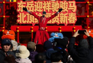 Prayers, festivities usher in Lunar New Year with robots