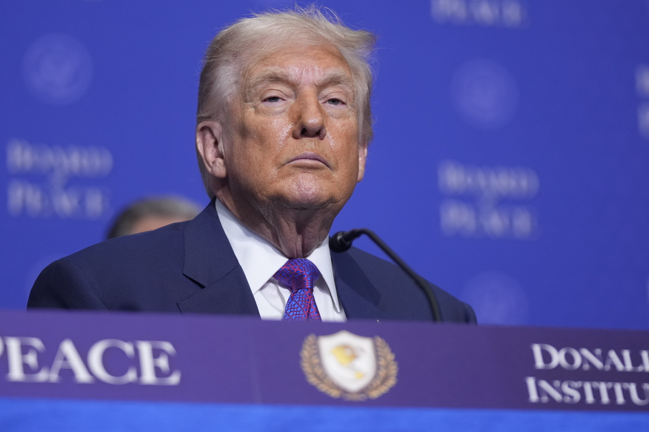 US President Donald Trump listens during a Board of Peace meeting at the US Institute of Peace in Washington on Thursday (local time) (AP-Yonhap)