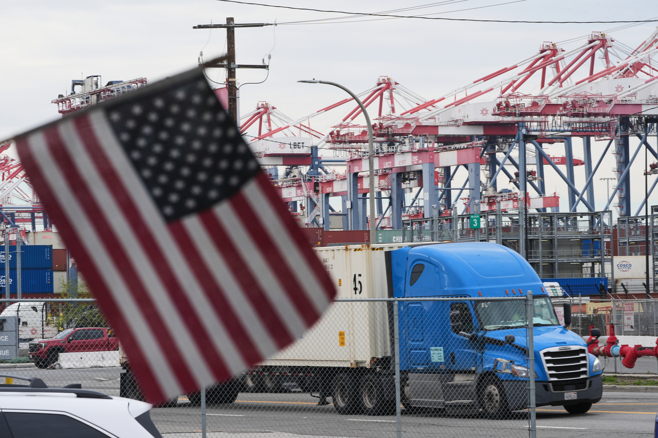 A US flag files at the Port of Long Beach Friday in Long Beach, California. (AP)
