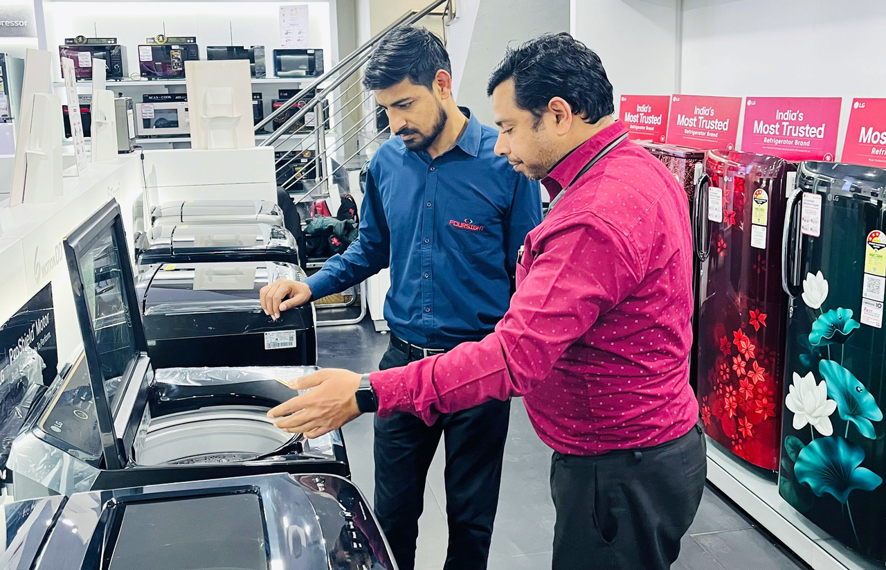 A customer looks at an India-exclusive washing machine by LG Electronics at an appliance store in India. (LG Electronics)