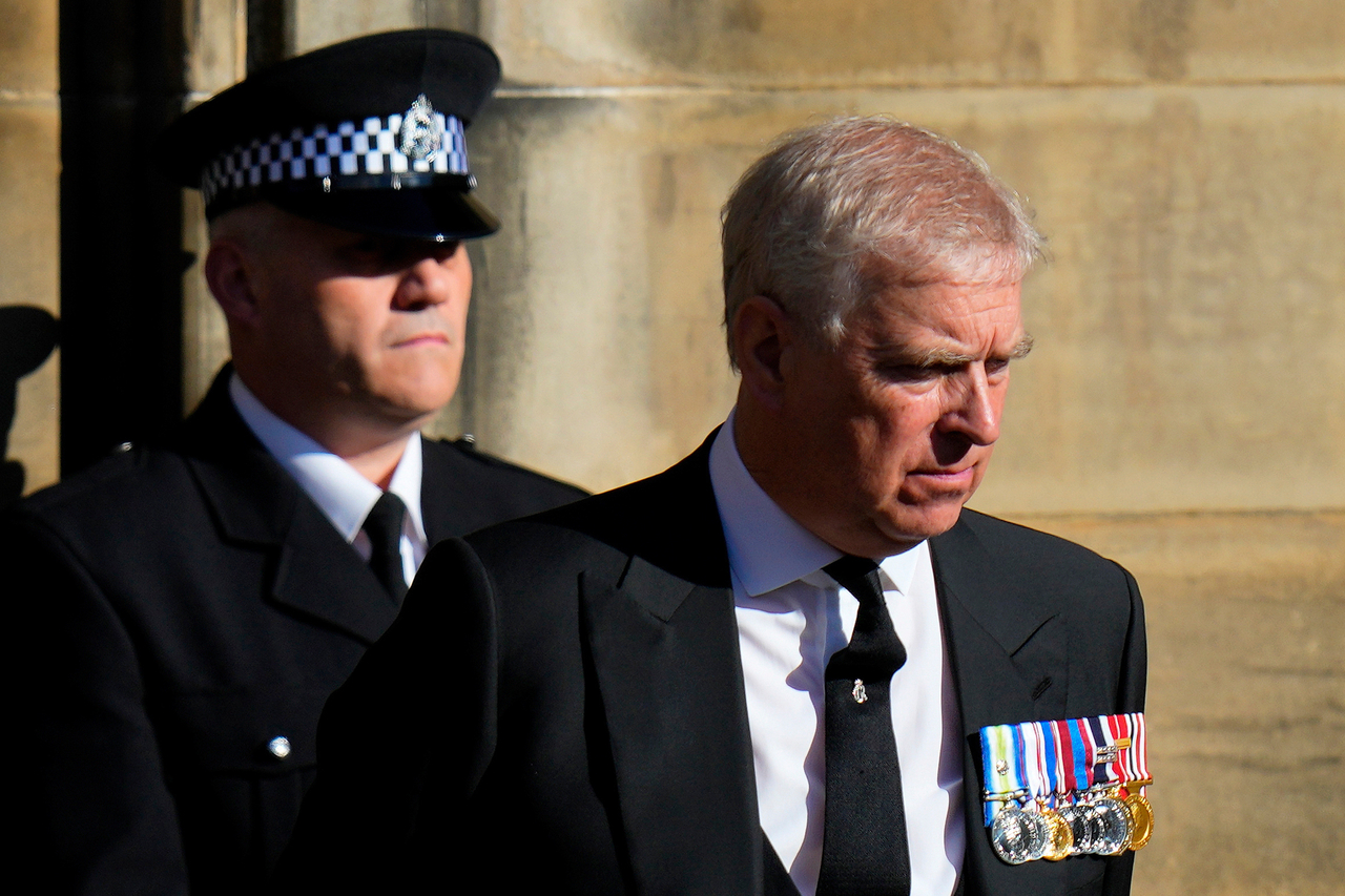 Prince Andrew (right) leaves St. Giles Cathedral after the arrival of the coffin containing the remains of his mother Queen Elizabeth, in Edinburgh, Scotland, in 2022. (AP-Yonhap)