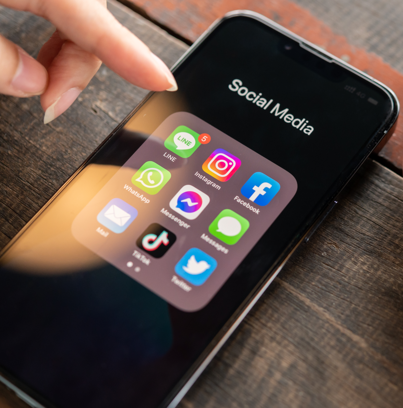 Social media apps are displayed on an iPhone. (123RF)
