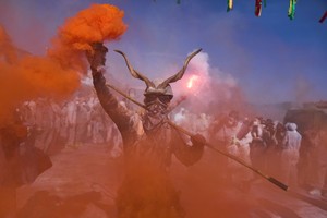 'Flour war' erupts in Greek seaside town as revelers celebrate the start of Lent