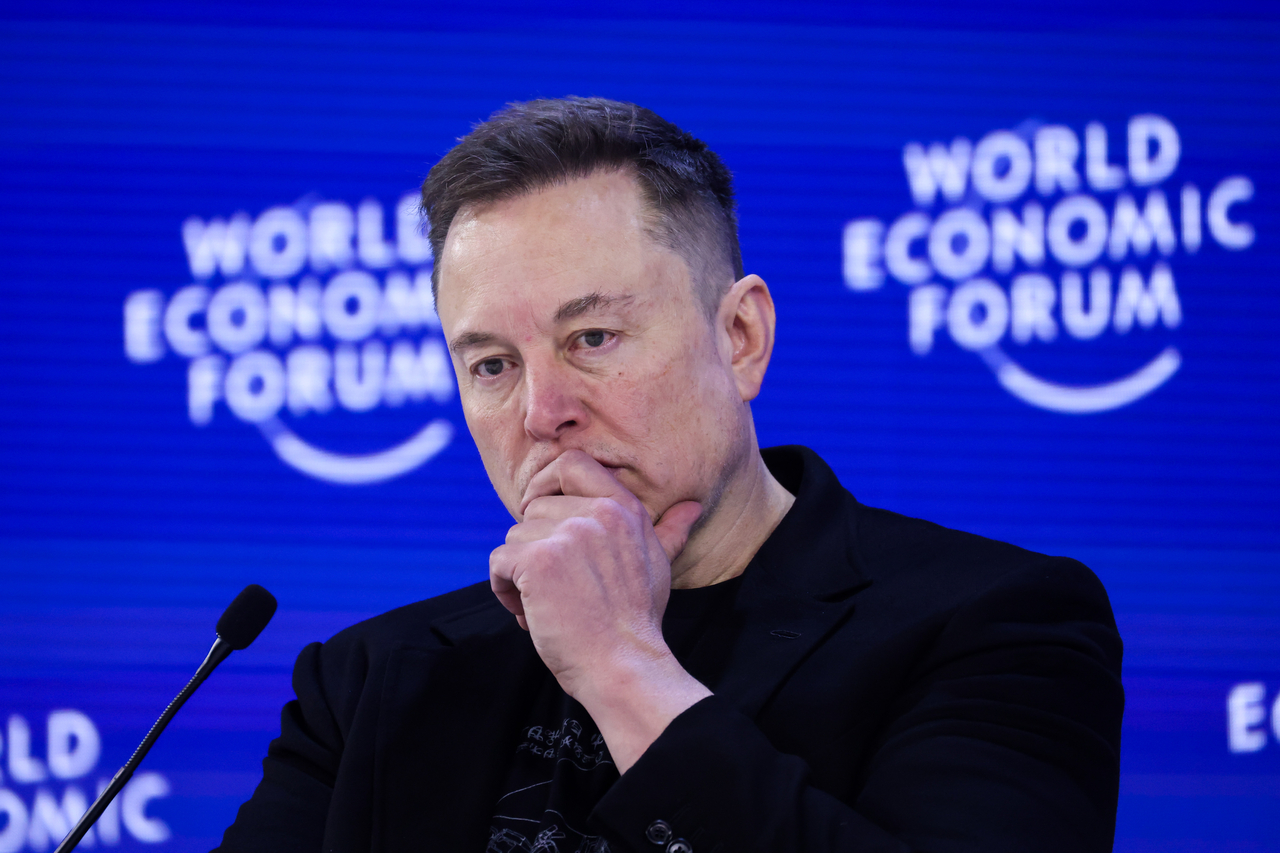 Teslsa CEO Elon Musk ponders during the World Economic Forum in Davos, Switzerland, Jan. 22. (Bloomberg)