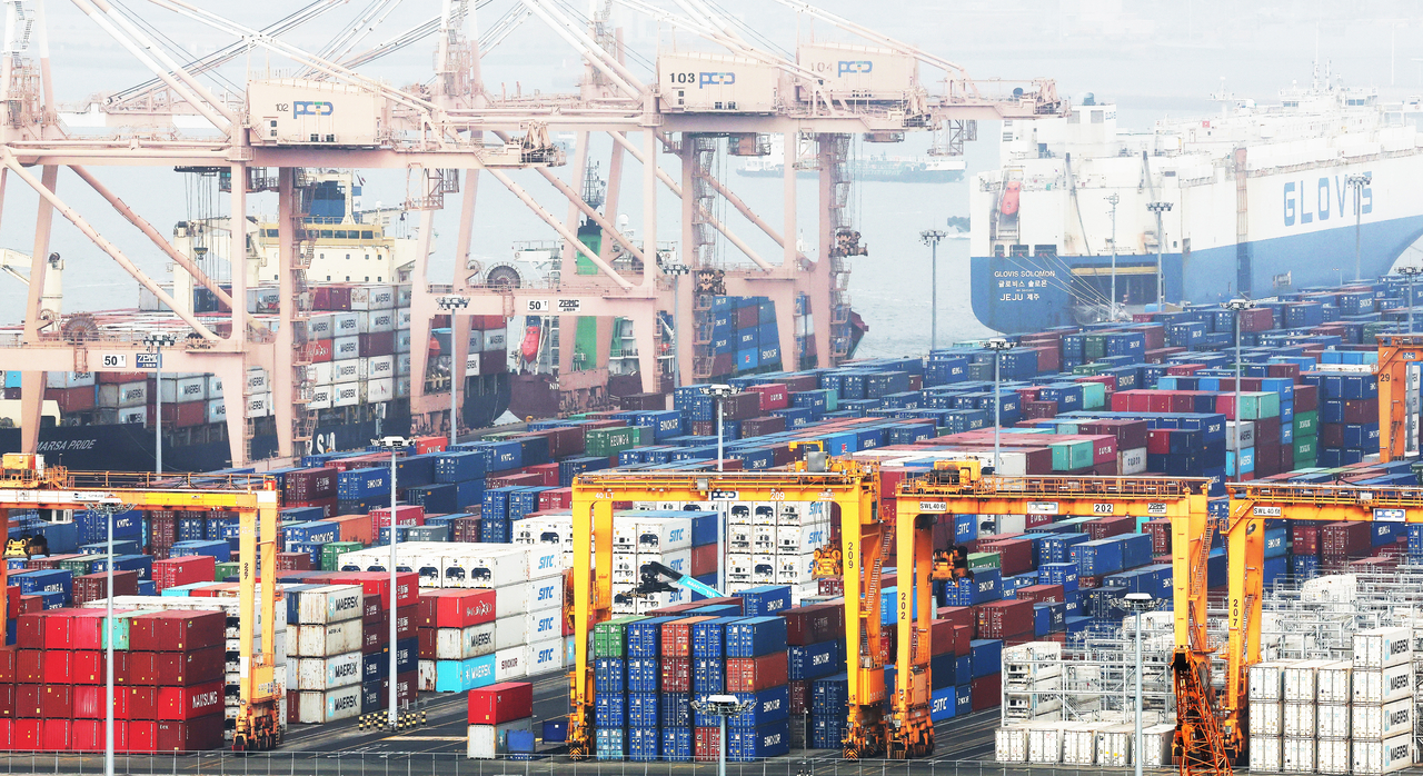 Containers are stacked at Pyeongtaek Port in Gyeonggi Province on Sunday. (Yonhap)