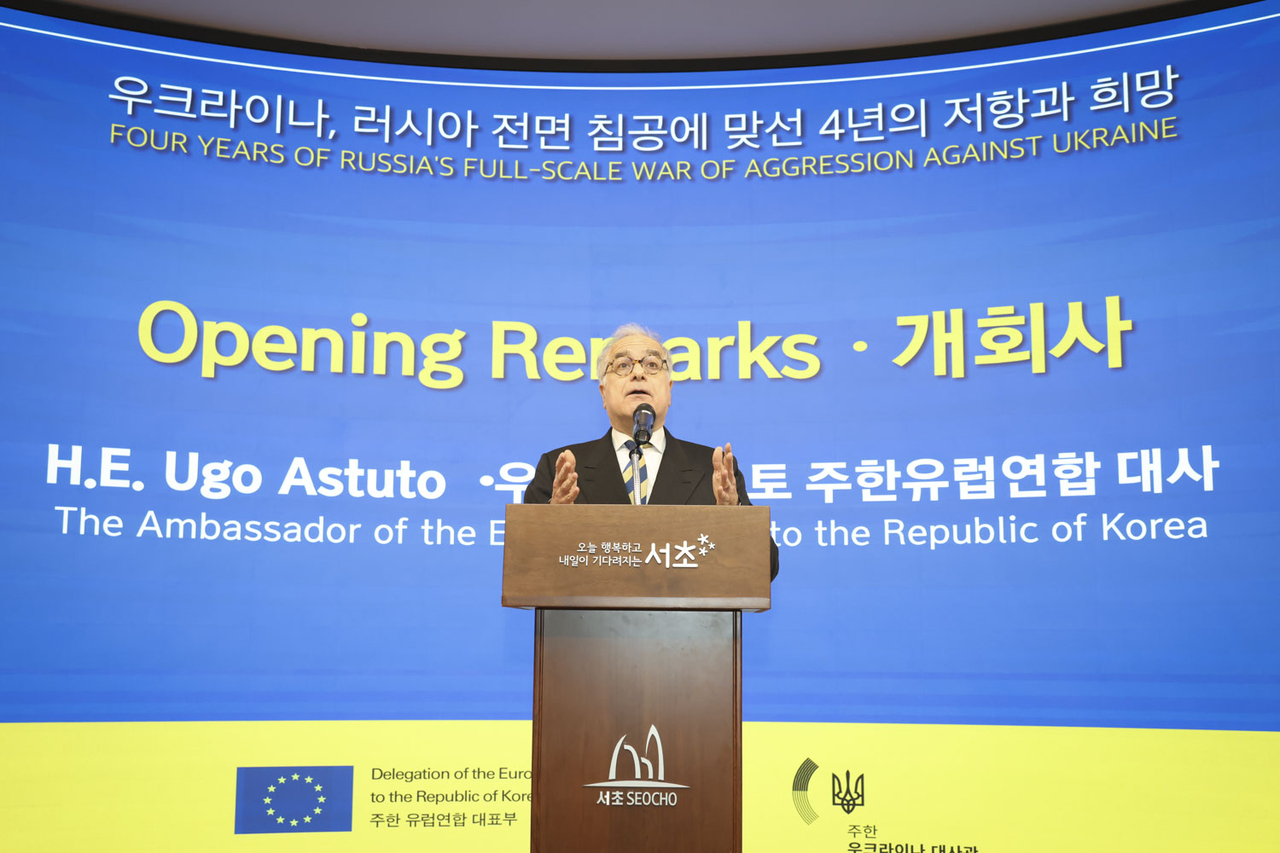 EU AmbassadorUgo Astuto speaks at the opening of an exhibition to mark the fourth anniversary of the war in Ukraine, in Seocho-gu, Seoul, Tuesday. (EU Delegation to Korea)