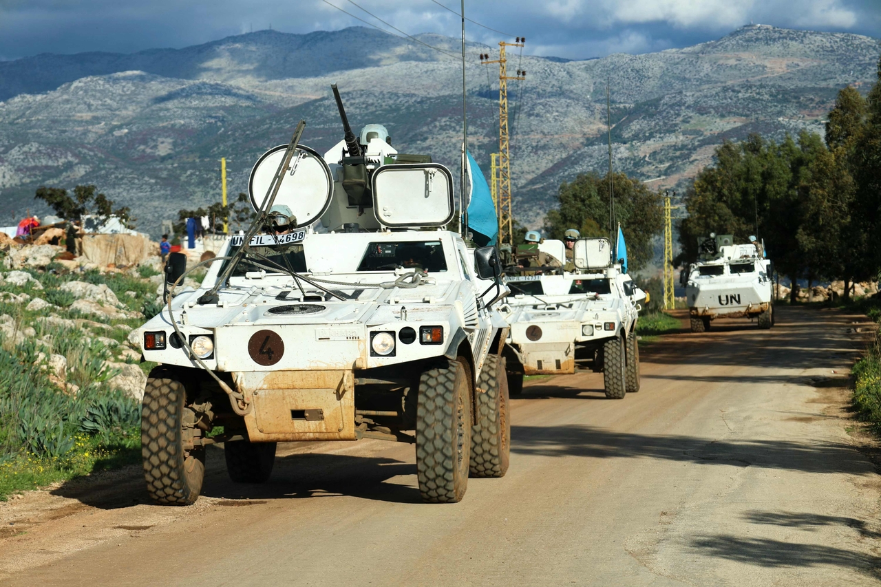 French peacekeepers of the United Nations Interim Force In Lebanon (UNIFIL) patrol at the entrance of the southern Lebanese border village of Sarada on February 24, 2026. Lebanon's army accused the Israeli military on Feb. 24 firing near a position it was setting up in the country's south, saying it had instructed troops to return fire. (Photo by Rabih DAHER / AFP)