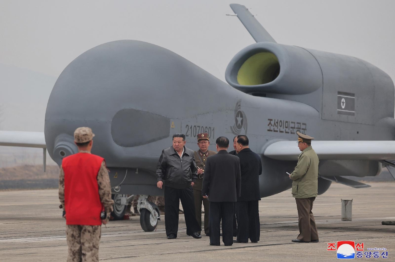 North Korean leader Kim Jong-un visited the Unmanned Aerial Technology Complex and the  Electronic Warfare Research Group on Feb. 25–26, 2025, to give on-site guidance for national defense science research projects, the Korean Central News Agency reported on March 27, 2025. A newly unveiled strategic reconnaissance UAV resembling the Global Hawk, bearing the serial number “21070601” was shown during the visit and appears to differ in appearance from the previously revealed Saebyeol-4 model. (KCNA-Yonhap)