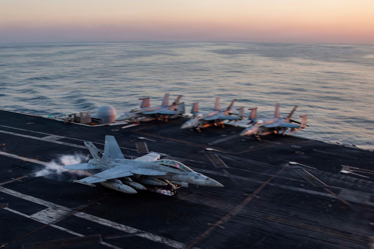 A F/A-18F Super Hornet prepares to make an arrested landing on the USS Abraham Lincoln in support of Operation Epic Fury, Saturday. (AP-Yonhap)
